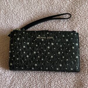 Michael Kors Black Wristlet with Silver Star Print
